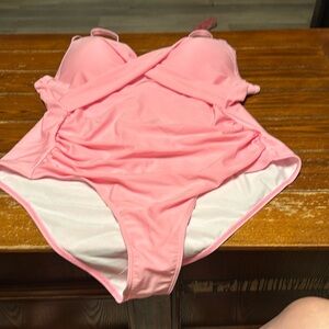 SHEIN one piece 4xl. Never worn.  Probably closer to a 2x in reality